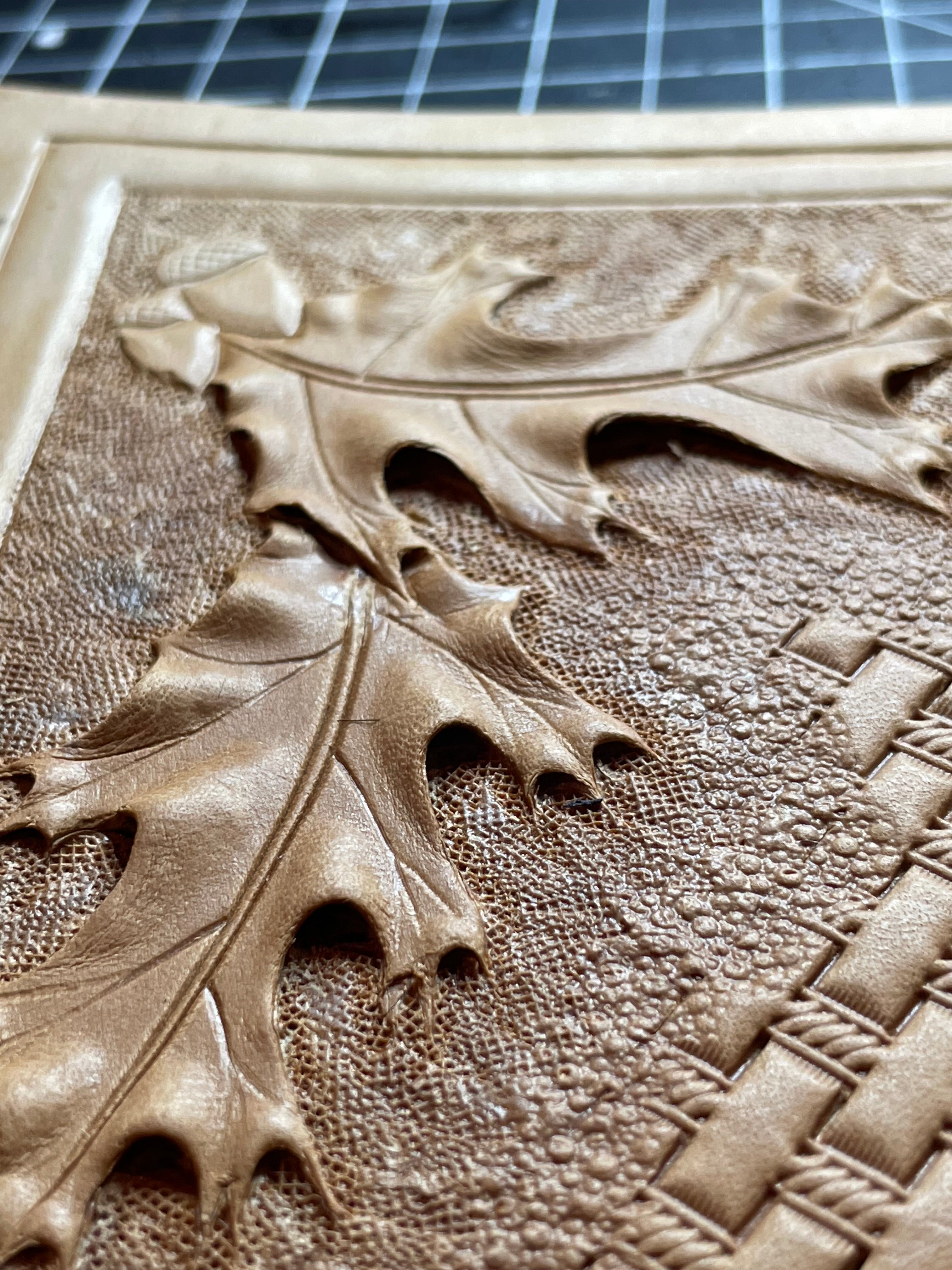 Custom leatherbound Bible featuring lifelike oak leaves, acorns, and basket weave design.